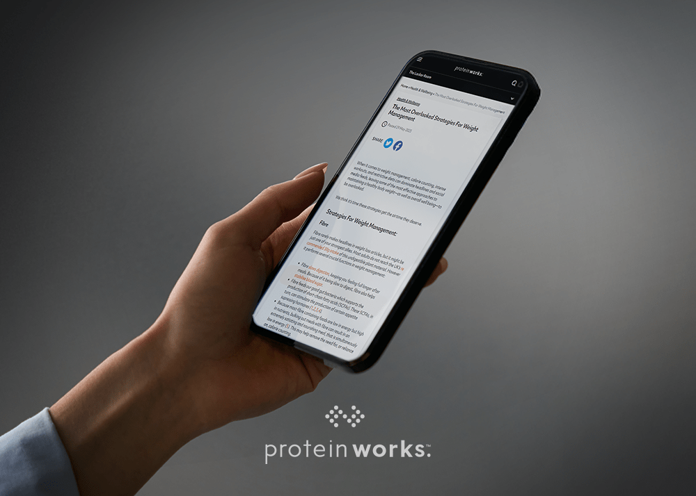 Phone holding an article about weight management